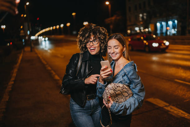 istock Using phone on city street 1224294037