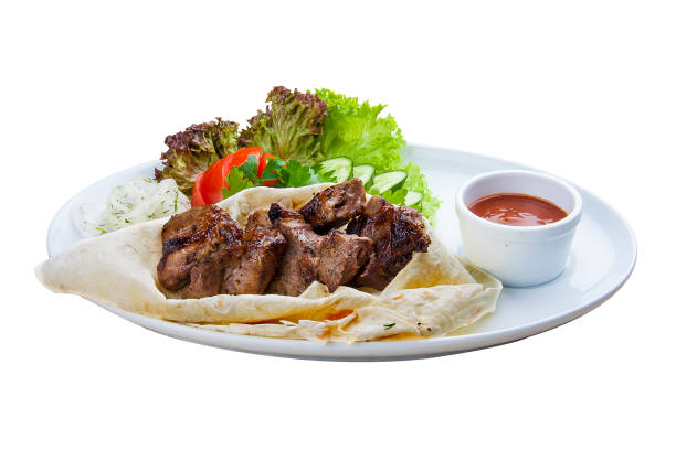 istock Beef shish kebab in pita bread. On a white plate 1224294079