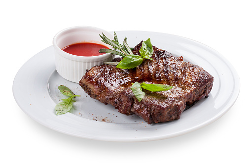 Beef steak is in Spanish style. On a white background