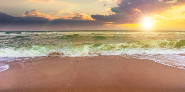 istock sandy beach and turquoise sea at sunset 1224296790
