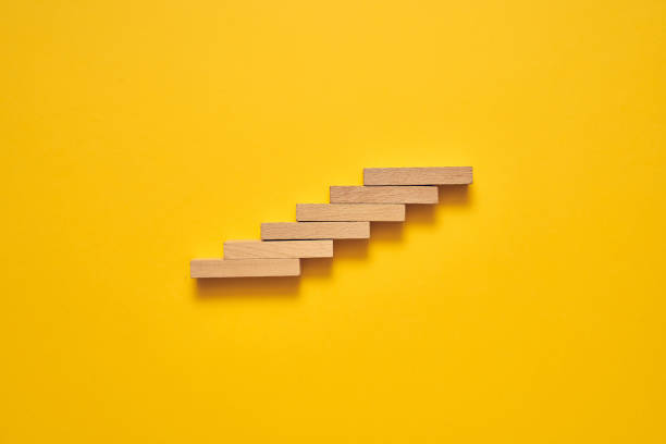 istock Climbing the stairs to success and progress in a conceptual image 1224296838