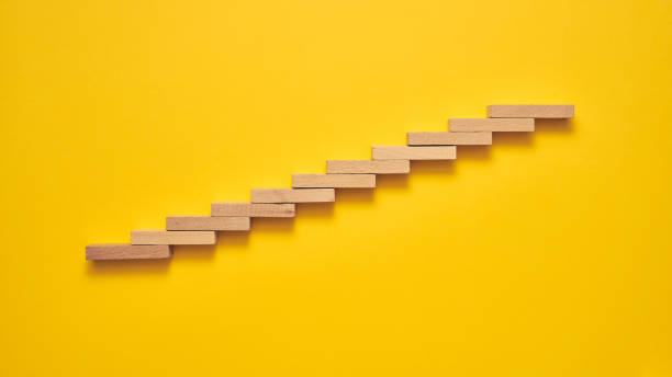 istock Climbing the stairs to success and progress in a conceptual image 1224296962