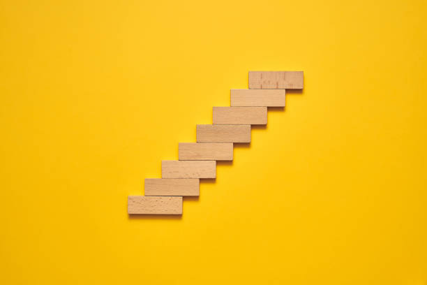 istock Climbing the stairs to success and progress in a conceptual image 1224297024