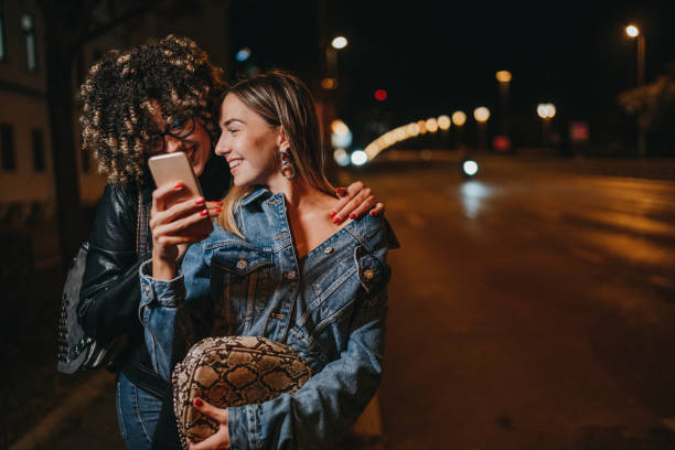 istock Using phone on city street 1224297059