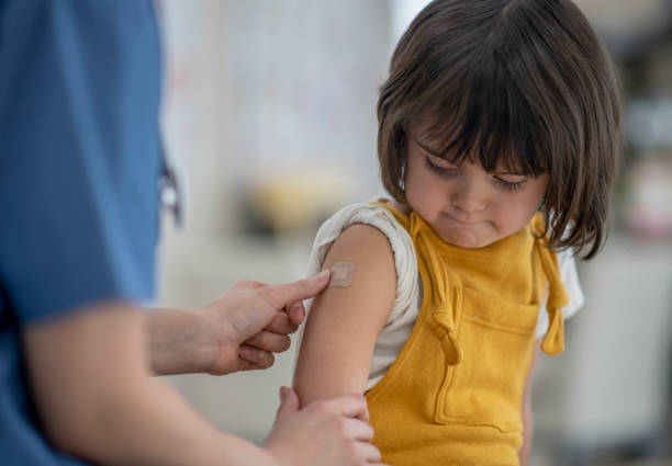 istock Little girl after immunization 1224299031