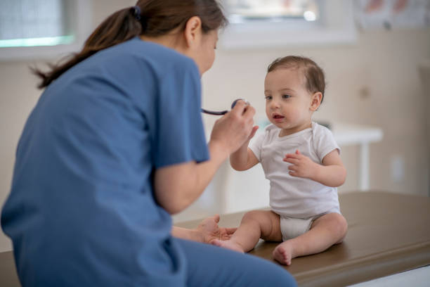 istock Baby boy at medical appointment 1224299044