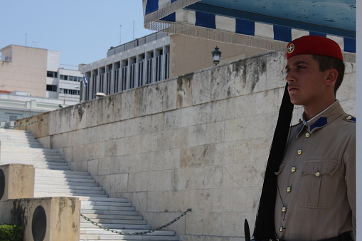 Athens, Greece: July 14, 2017 - the Evzones or Evzonoi - Greek soldier. This is the name of several historical elite light infantry and mountain units of the Greek Army. Today, it refers to the members of the Presidential Guard in Athens and other places. The most visible item of this uniform is the fustanella, a kilt-like garment. Their distinctive dress turned them into a popular image for the Greek soldier, especially among foreigners.