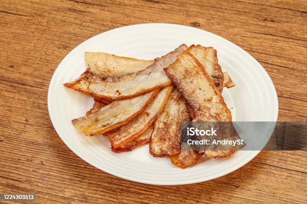 Roasted Juicy Bacon In The Plate Stock Photo - Download Image Now - Appetizer, Backgrounds, Bacon