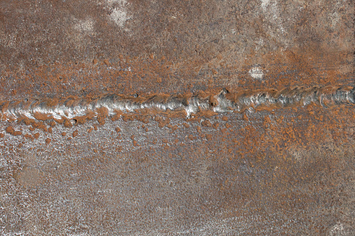 rusty metal background in grunge style. Old metal texture. Top view. Mock up