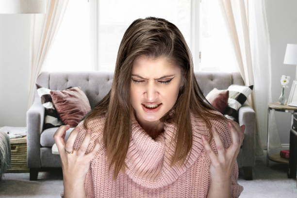 istock Woman Getting Angry and Impatient with Pandemic Lockdown 1224308088