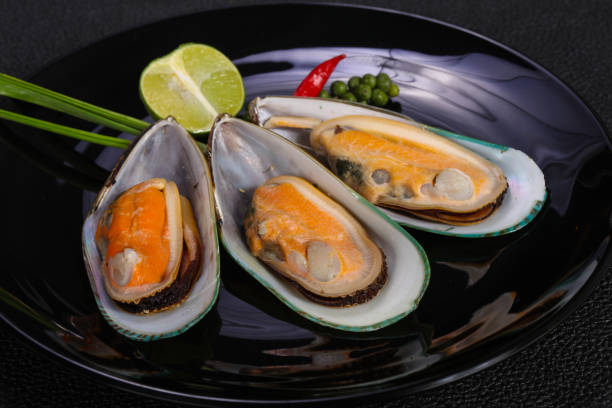 istock Half mussels with lime and pepper 1224310432