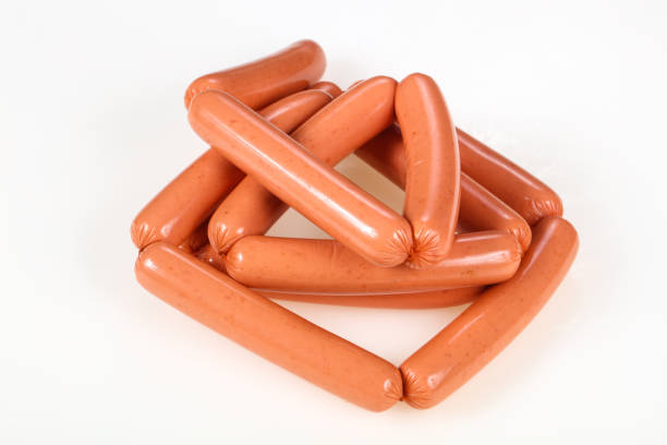 Tasty meat sausages ready for eat over white background
