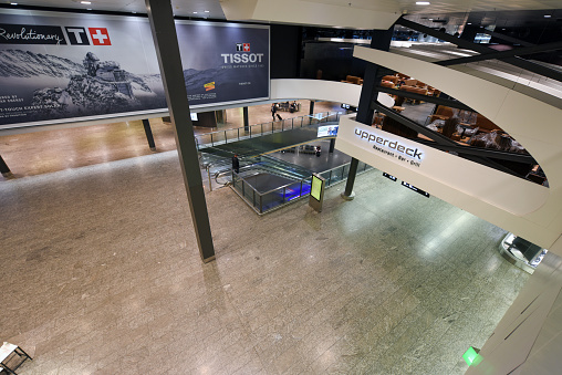 The Zurich Airport ZRH during the Corona Pandemic (COVID-19). Inside view of the departure Hall to Gate B captured during the siwsswide Lockdown.
