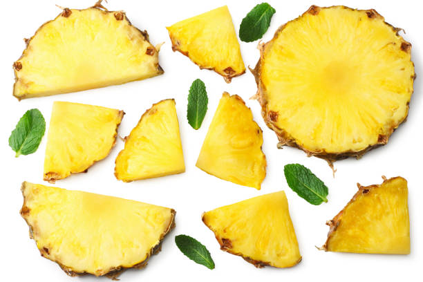 istock Sliced ripe pineapple isolated on white background. healthy background. top view 1224312565