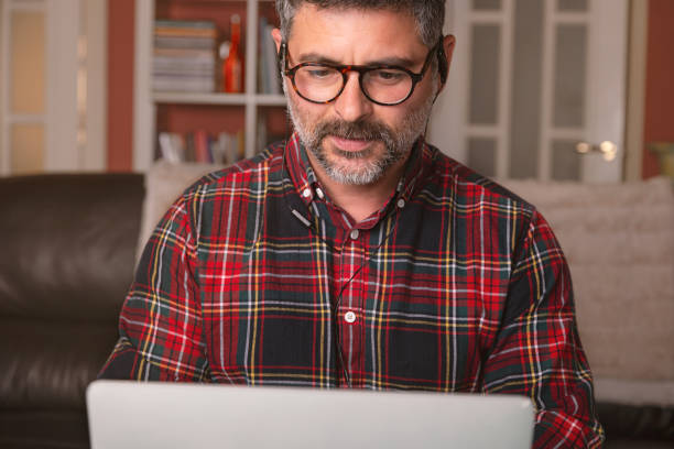 istock Men working from home, making video calls at work conference. Work at home. Remote work. 1224313527