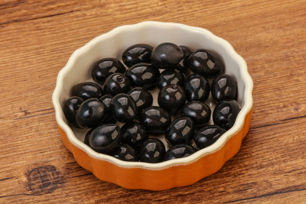 istock Black olives in the bowl 1224313596