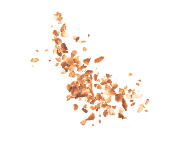 istock Bread crumbs isolated on white background, scattered crumbs 1224316179