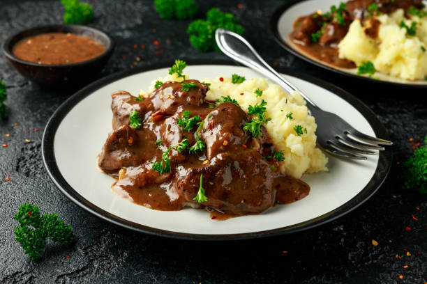 istock Fried Liver in gravy with mashed potato 1224316247