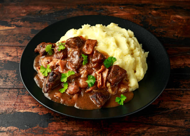 istock Fried Liver, bacon in onion gravy with mashed potato 1224316262
