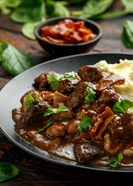 istock Fried Liver, bacon in onion gravy with mashed potato 1224316929