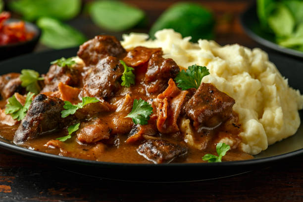 istock Fried Liver, bacon in onion gravy with mashed potato 1224316949
