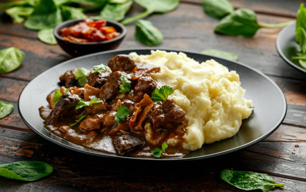 istock Fried Liver, bacon in onion gravy with mashed potato 1224316952