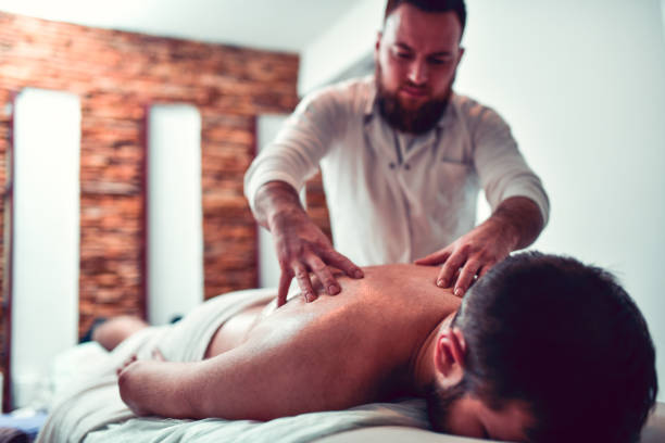 istock Massage Therapy For Young Male By Professional Therapist 1224320626