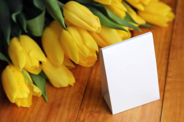 gift card and flowers . stock photo