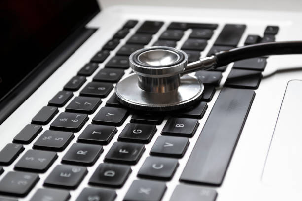 istock stethoscope close-up on a laptop. Telemedicine concept 1224323312