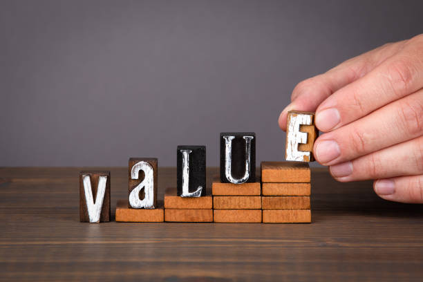 istock VALUE concept. Wooden alphabet letters on steps 1224324570