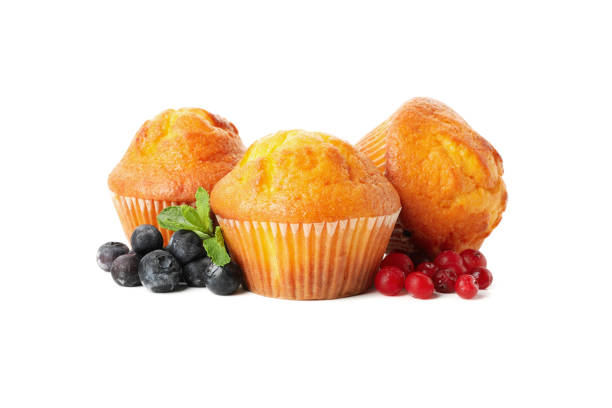 istock Muffins, berries and chocolate isolated on white background 1224328624