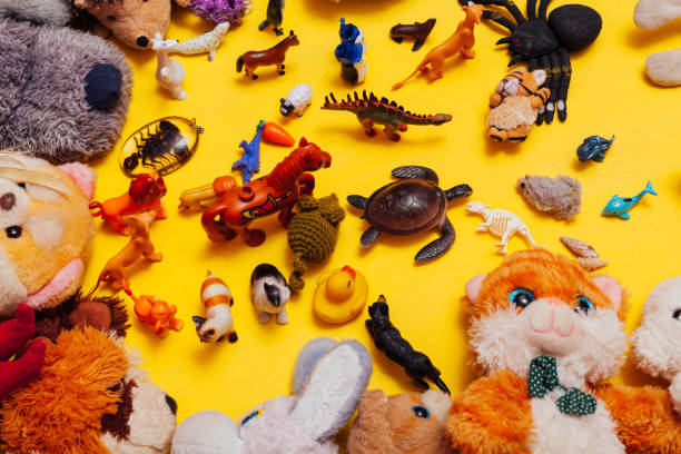 istock Children's soft toys for developing baby games on a yellow background 1224329720