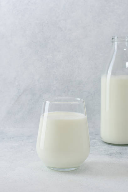 istock A glass and bolt with fresh milk on light background with copy space. 1224332005