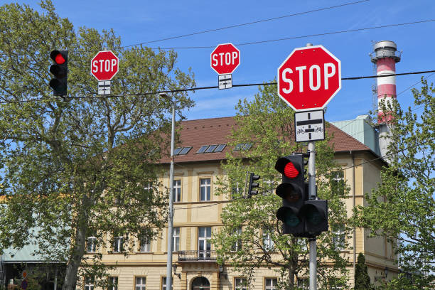 Red traffic light and Go straight or left and Stop signs. Mandatory and Prohibitory signs. Road signs in Israel