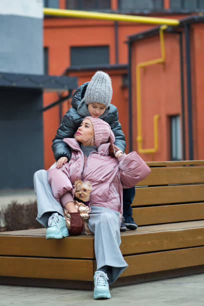 istock Happy family on walk the dog 1224332962