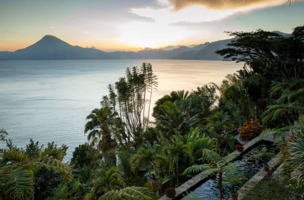 istock sunset over Lake Atitlan from a tropical garden 1224338127