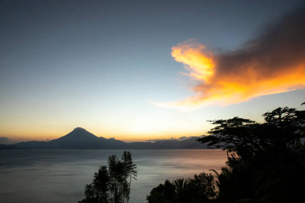 istock sunset over Lake Atitlan from a tropical garden 1224338134