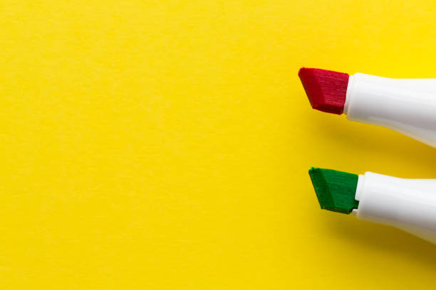 istock Color markers lie on a yellow background. copyspace for text 1224340261