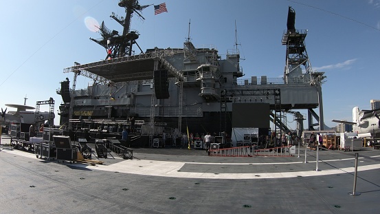 Newport News Shipyard and old commissioned Warship. Ship building and reconstruction near communication tower, Virginia