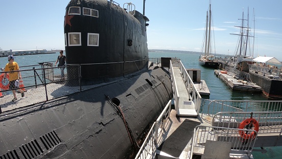 San Diego, Navy Pier, California, USA - August 1, 2018: CCCP Soviet Submarine B-39 with Soviet Union Red star at San Diego Navy Pier in United States. Open for visits inside and outside.