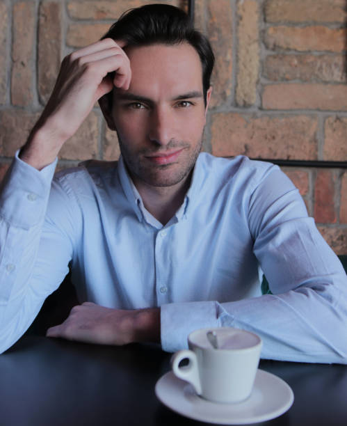 istock Young stylish businessman having  coffee 1224347958