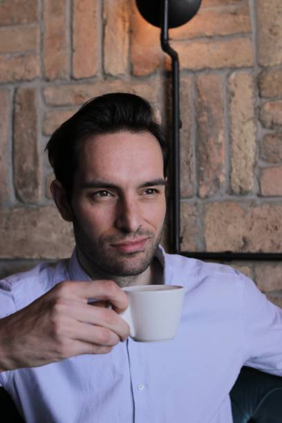 istock Young stylish businessman having  coffee 1224348111