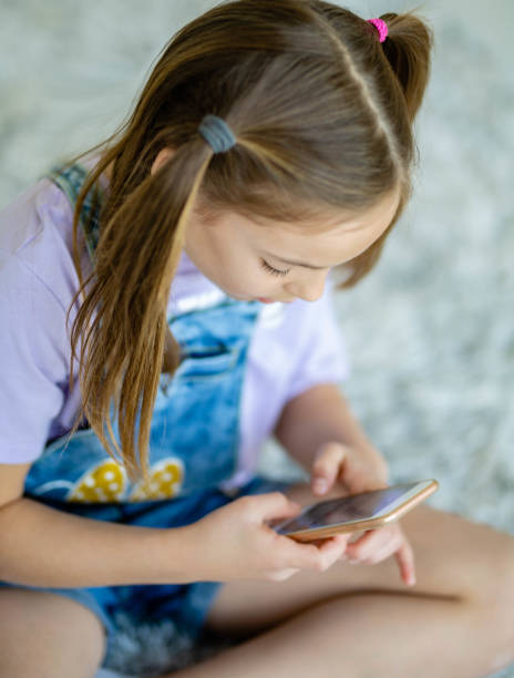 istock Young teenage girl using mobile 1224355691