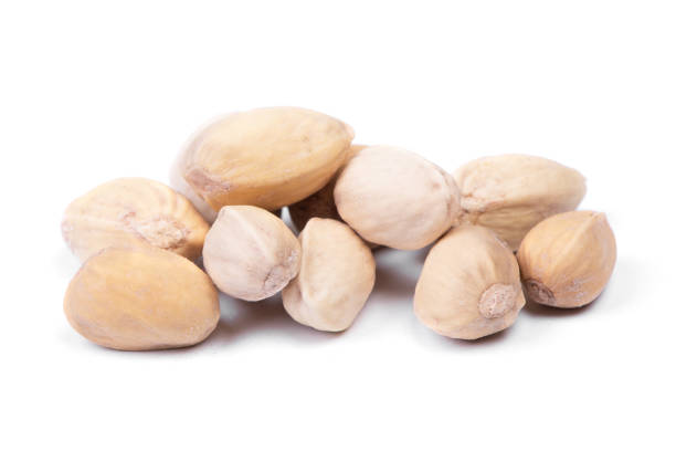 istock Heap of closed unopened pistachios 1224358541