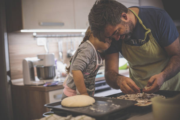 istock Little chef assistant tired after making homemade pizza 1224359054