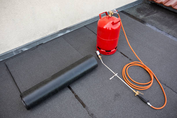 istock Gas torch and bottle for bitumen roofing felt 1224359317