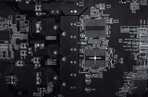 Texture of computer circuit board, black motherboard background