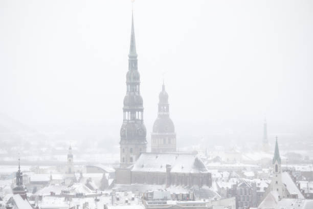 istock Riga dome and st. Peter cathedrals in the fog 1224364479