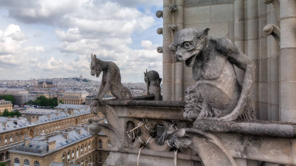Gargoyle statue, chimeras, in the form of a medieval winged monster, from the royal castle in Bana hill, tourism site in Da Nang, Vietnam. Gothic old vintage gargoyle in a french village near Danang