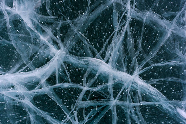 istock Beautiful ice of Lake Baikal with abstract cracks 1224365254